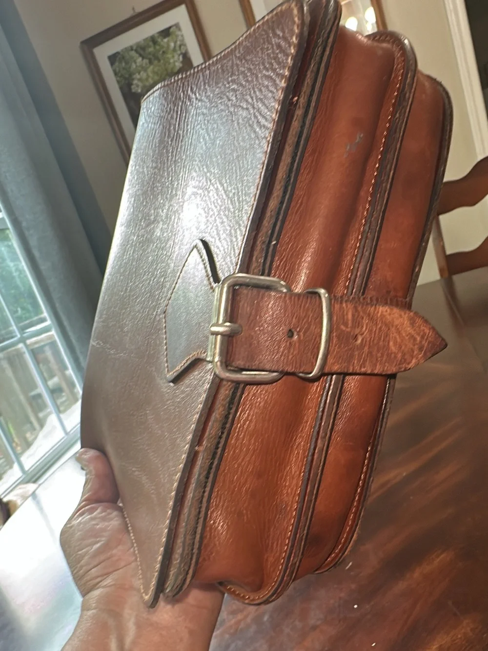 Classic Brown Leather bag- Stylish Buckle Closure. No straps no info about it.